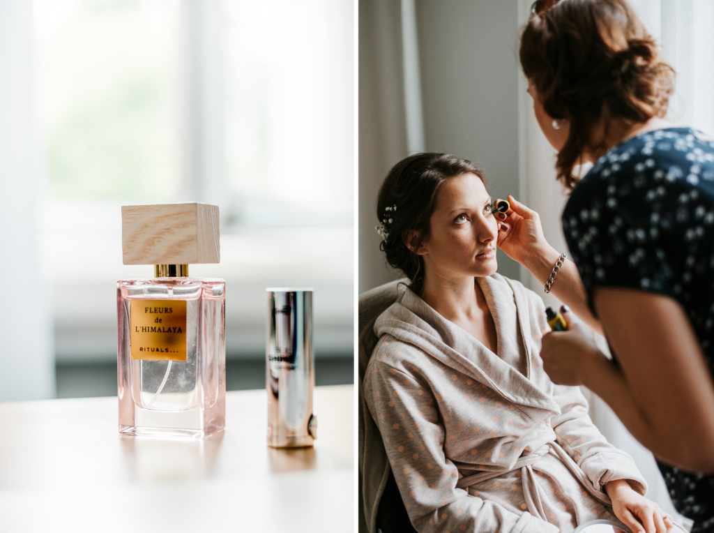 Parfümflasche links, Frau im Bademantel, bekommt auf der rechten Seite Make-up aufgetragen.